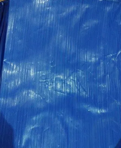 Close-up of a blue multilayer tarpaulin sheet