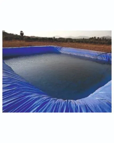 Blue tarpaulin lining a water storage pit