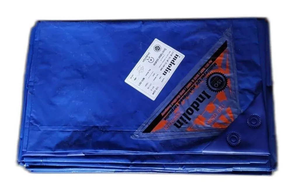 Folded blue Indoline multilayer tarpaulin with product label