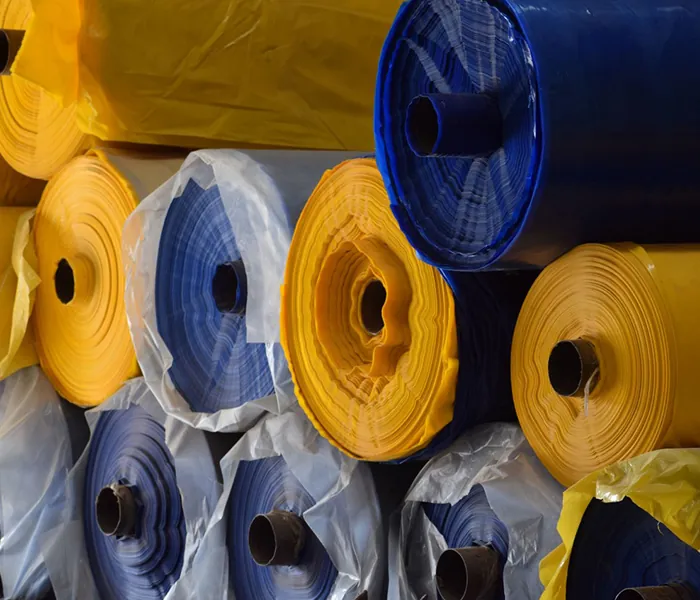 Yellow, blue and white multilayer tarpaulin rolls